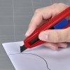 Nóż z odłamywanym ostrzem Knipex CutiX 90 10 165 BK