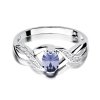 Pierścionek złoty 585 z brylantami 0,05ct tanzanitem 0,40ct W-28