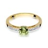 Pierścionek złoty 585 oliwin 0,60ct brylantami 0,05ct W-66