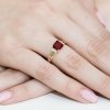 Pierścionek złoty 585 z brylantami 0,03ct granatem 1,30ct W-103
