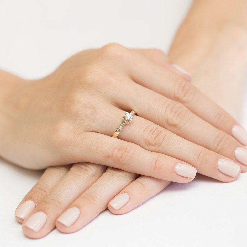 Pierścionek złoty 585 z brylantami 0,25ct W-291