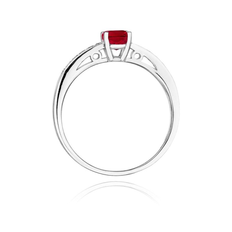 Pierścionek złoty 585 rubin 0,60ct brylanty 0,05ct W-66
