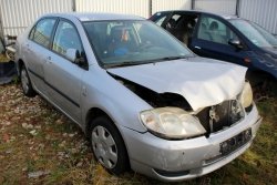 Zamek drzwi przód prawy Toyota Corolla E12 2002 Sedan