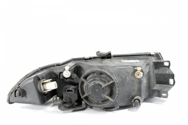 Reflektor lewy Mitsubishi Carisma DA2A Lift 2000-2004