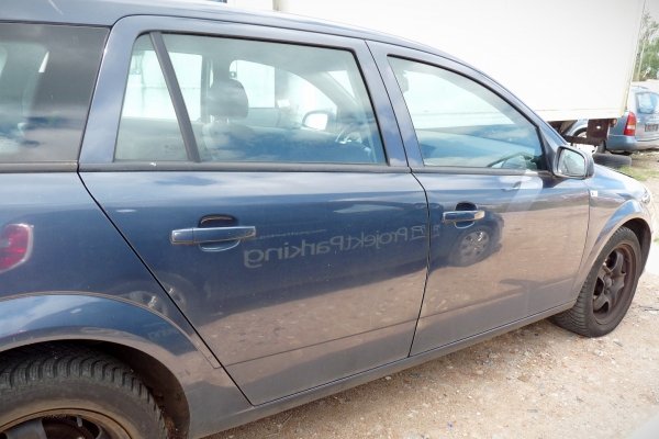Drzwi przód lewe Opel Astra H 2010 Kombi (kod lakieru: GBI)