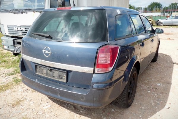 Błotnik przód prawy Opel Astra H 2010 Kombi (kod lakieru: GBI)