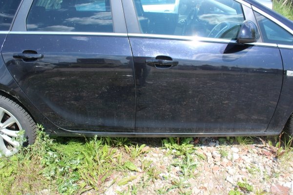 Szyba karoseryjna lewa Opel Astra J 2011 Kombi
