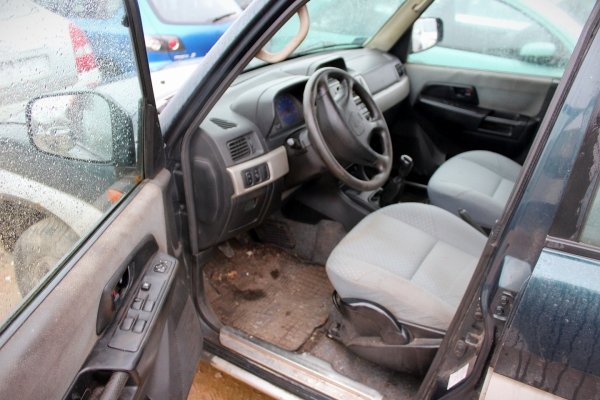 Zamek drzwi tył prawy Mitsubishi Pajero Pinin 2003