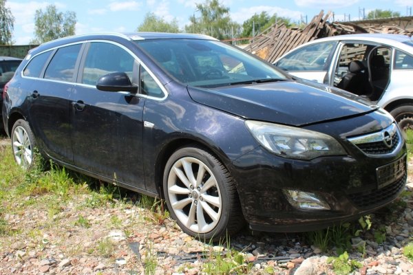 Zamek drzwi przód lewy Opel Astra J 2011 Kombi