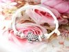 GOLDENES ARMBAND MIT EDELSTAHL