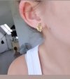 gold earrings made of stainless steel