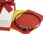 GOLDENES ARMBAND MIT EDELSTAHL