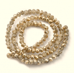 4146c Sznury koralików szklanych fasetowanych kryształki przezroczystych, malowanych, jasnobrązowych, 4 x 3 mm, otwór: 1 mm, około 112 szt