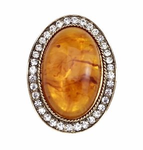 элегантная золотая брошь