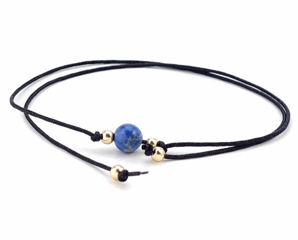 GOLDENES ARMBAND MIT EDELSTAHL