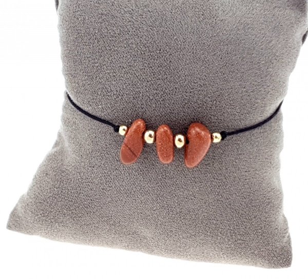 GOLDENES ARMBAND MIT EDELSTAHL