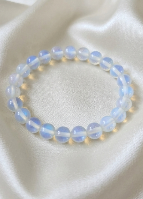 1936k Bransoletka opal na gumce jubilerskiej