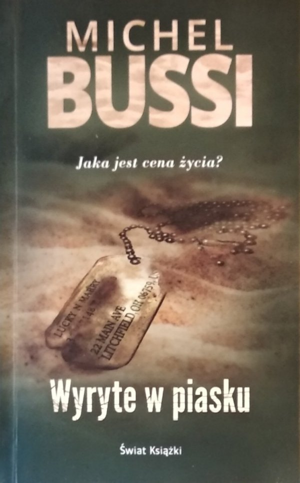 Michel Bussi • Wyryte w piasku