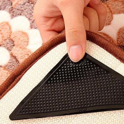 Naklejki antypoślizgowe pod dywan 4 sztuki – podkładki samoprzylepne do wykładzin i dywanów