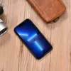iCarer Leather Oil Wax etui iPhone 14 Pro Max skórzany pokrowiec czarne (WMI14220720-BK)