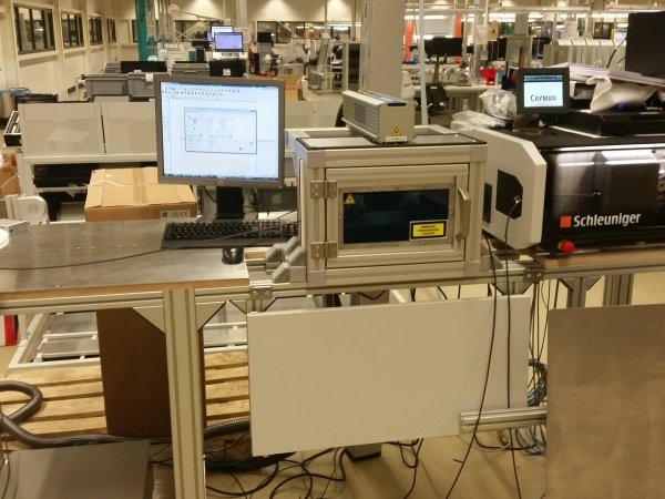 Laser cabinet for the use in cable marking