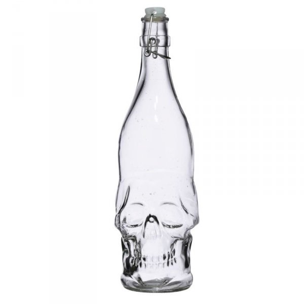 szklana butelka w kształcie czaszki z zatyczką
