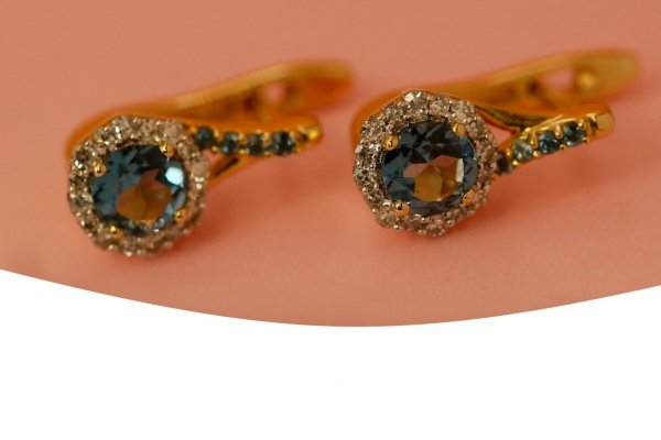 Kolczyki diamenty 32/0,12cT angielskie złoto 585