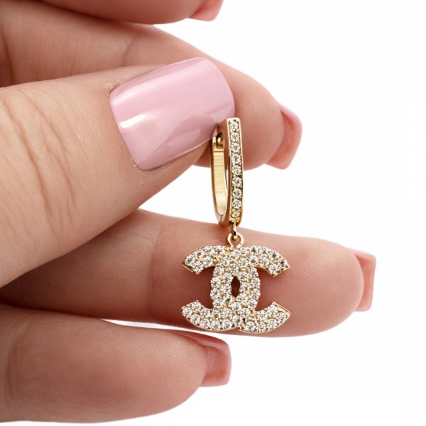 Wiszące kolczyki literki z kamieniami złoto 585