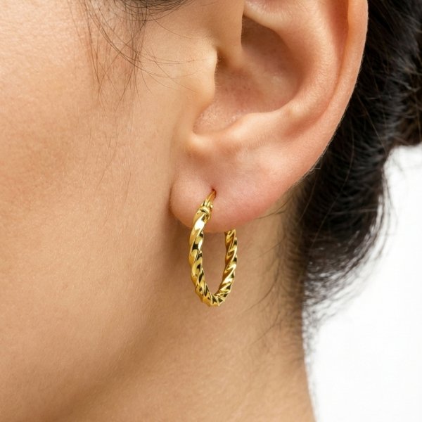 Kolczyki skręcone koła 3D złoto 585 