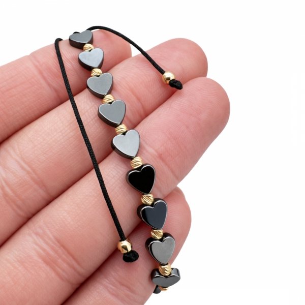 Bransoletka z sercami na sznurku złoto 585