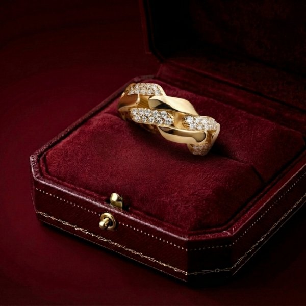 Pierścionek warkocz cyrkonie R. 14 złoto 585 