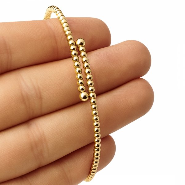 Bransoletka z motywem kul złoto 585 