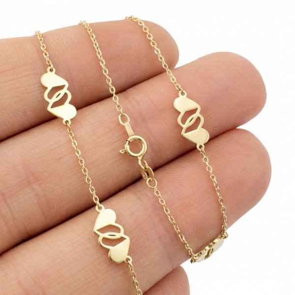 Bransoletka podwójne serca złoto 585 