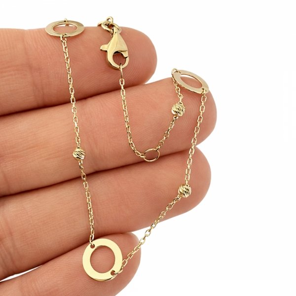 Bransoletka z obręczami i kulami złoto 585