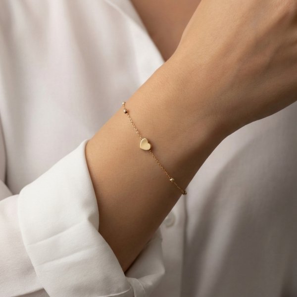 Bransoletka z sercem i kulami diamentowanymi złoto 585