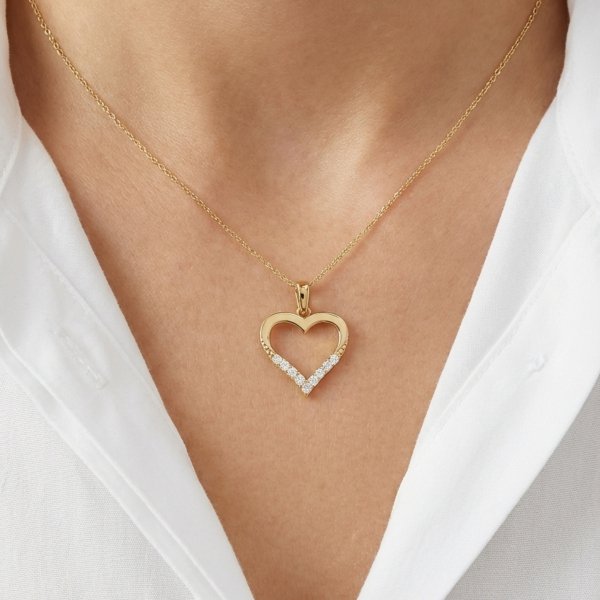 Zawieszka kontur serca wstęga kamieni złoto 585