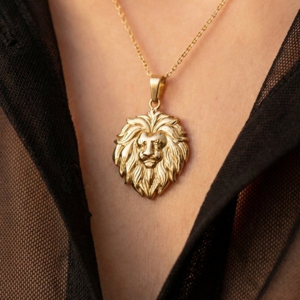 Wisior głowa LWA KUTY wybrany  złoto 585 