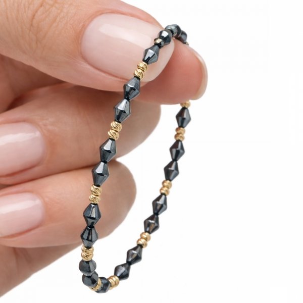 Bransoletka ze złotymi kulami i hematytem złoto 585 