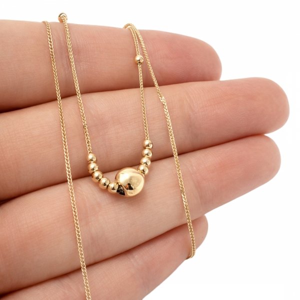 Naszyjnik z ruchomymi kulami złoto 585