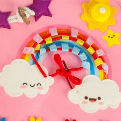 Tablica manipulacyjna sensoryczna montessori walizka plecak różowa