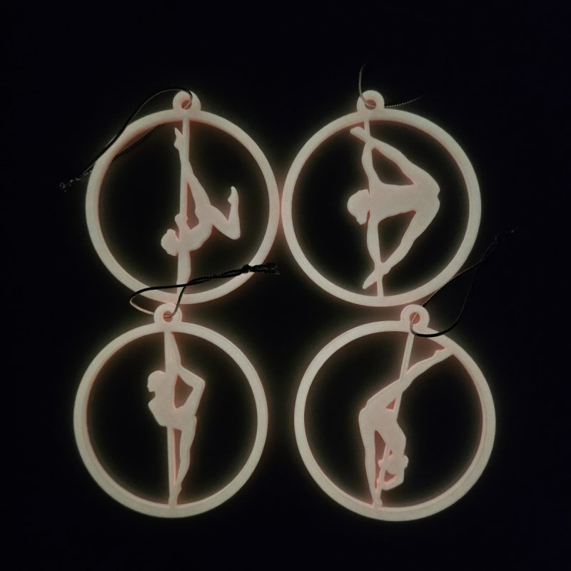 Set of 4 Pink Glow in the Dark Pole Dance Christmas Ornaments displayed together on a blue background. Amira Perun Poledance Decor