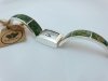 srebrny zegarek z zielonym naturalnym bursztynem