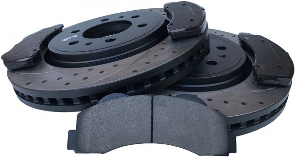 Przednie klocki + WIERCONE tarcze hamulcowe Ford Expedition 2010-2021