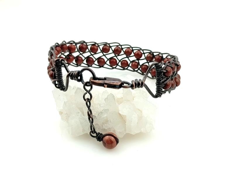 Bransoletka miedziana o splocie Kumihimo z kulkami jaspisu czerwonego dla numerologicznej 1, 4, 6 i 9