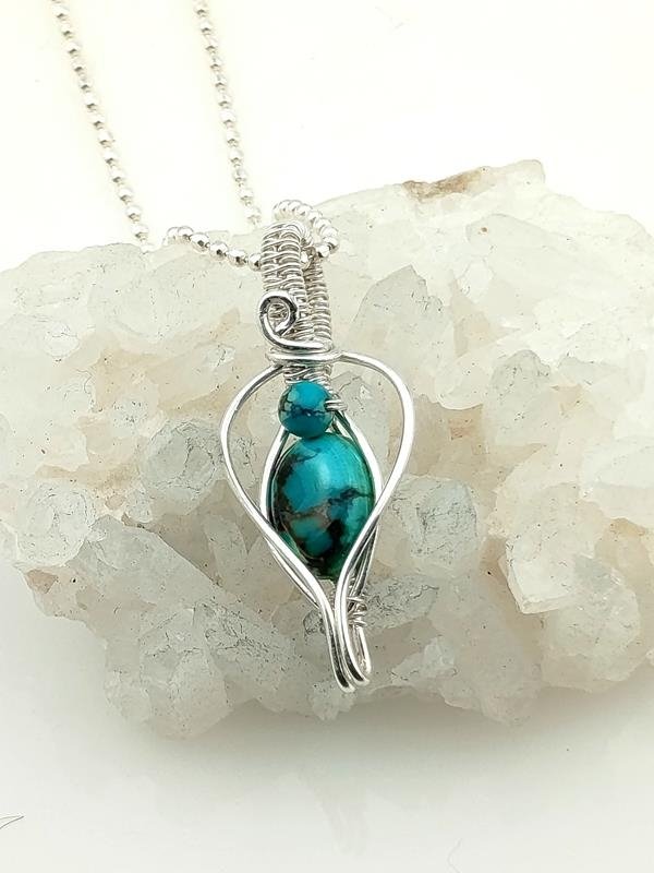 Wisiorek ze srebra Ag999 z turkusem tybetańskim – kamieniem komunikacji i rozwoju duchowego