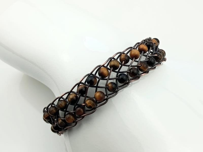 Regulowana bransoletka miedziana o splocie Kumihimo z kulkami tygrysiego oka dla znaku Lwa, Koziorożca, Bliźniąt, Panny, Barana, Byka i Wodnika