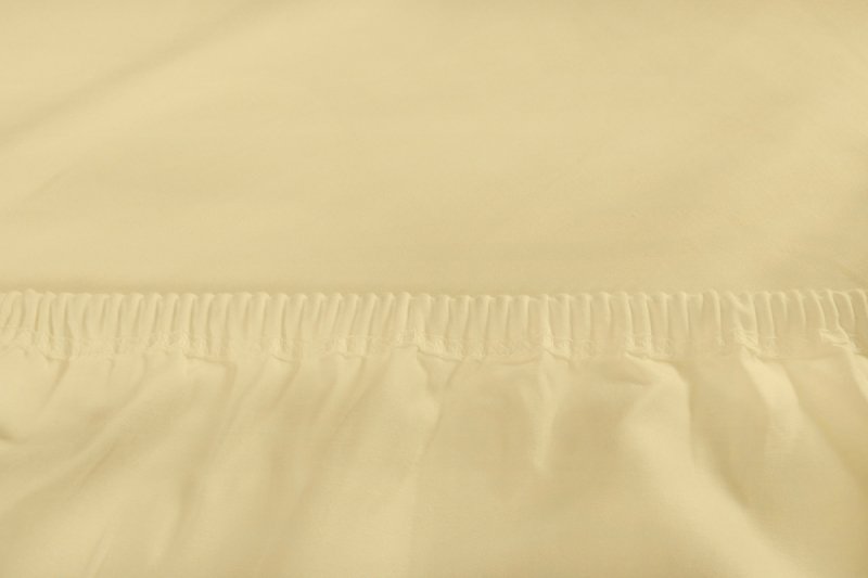 Prześcieradło PREMIUM jersey z lycrą na wysoki materac 90x200 z gumką wz. 04A budyniowy