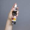 Pobudzający olejek do masażu brzoskwinia wino musujące 50 ml
