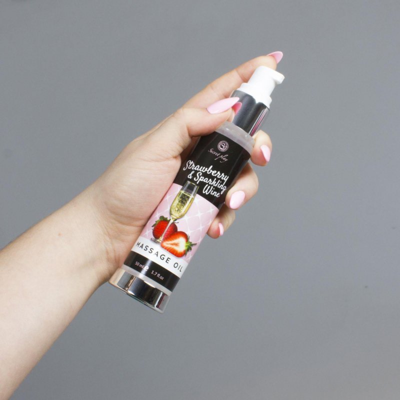 Pobudzający olejek do masażu truskawka wino musujące 50 ml