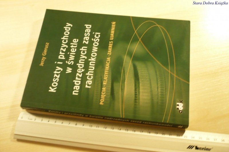 KOSZTY I PRZYCHODY W ŚWIETLE NADRZĘDNYCH... (2006)